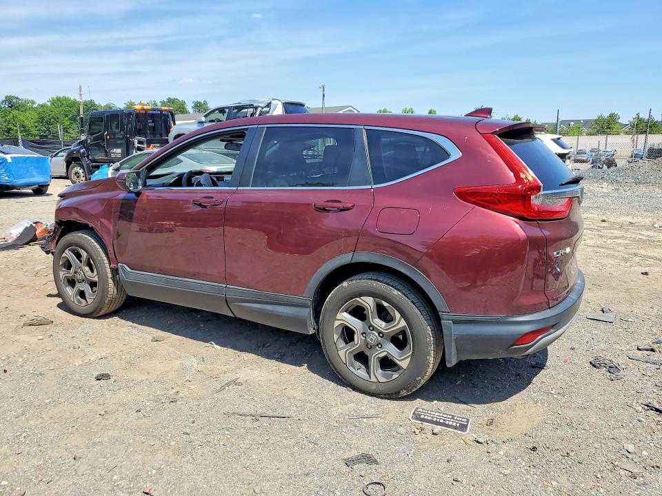 Photo 2 from auction – 2018 HONDA CR-V with VIN 2HKRW2H54JH694441
