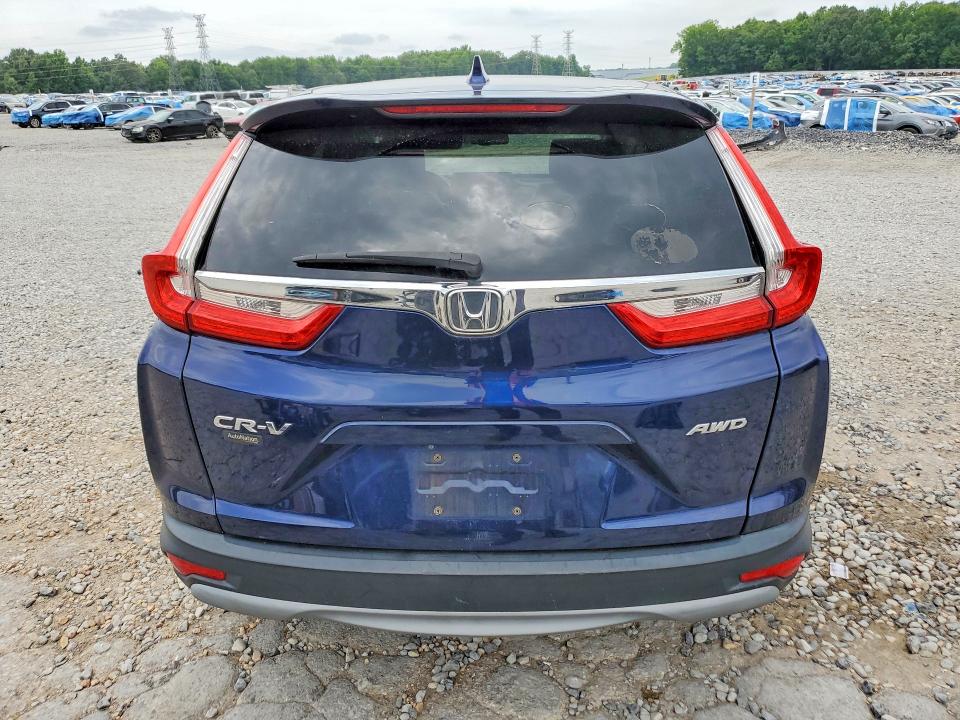 Photo 6 from auction – 2017 HONDA CR-V with VIN 2HKRW2H80HH679309
