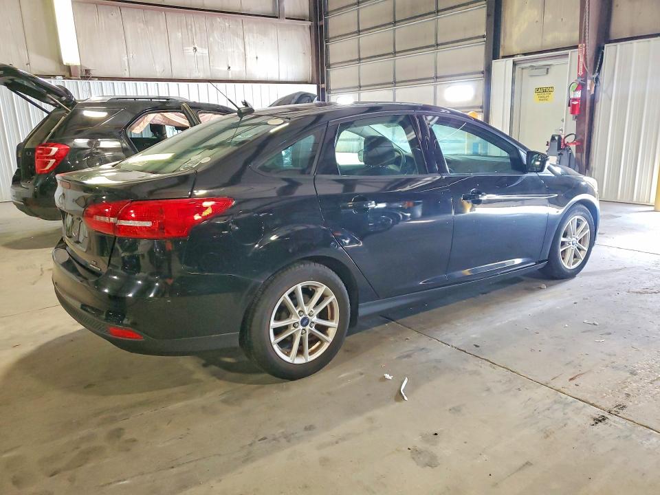 Photo 3 from auction – 2016 FORD FOCUS with VIN 1FADP3F29GL397732