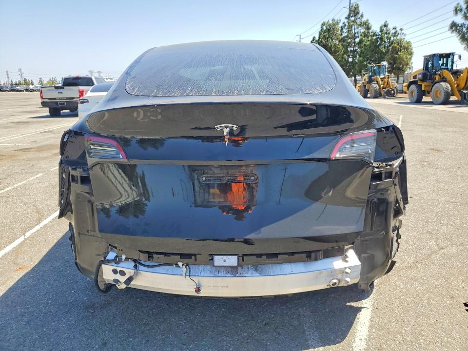 Photo 6 from auction – 2023 TESLA MODEL Y with VIN 7SAYGDED3PF980193