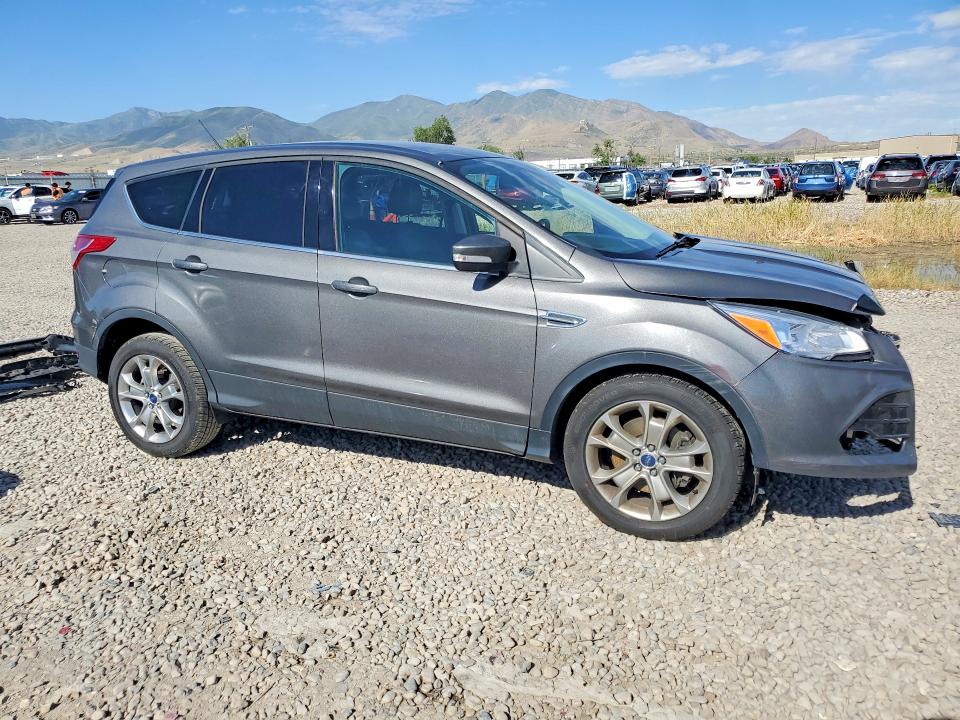 Photo 4 from auction – 2013 FORD ESCAPE with VIN 1FMCU9H97DUA17350