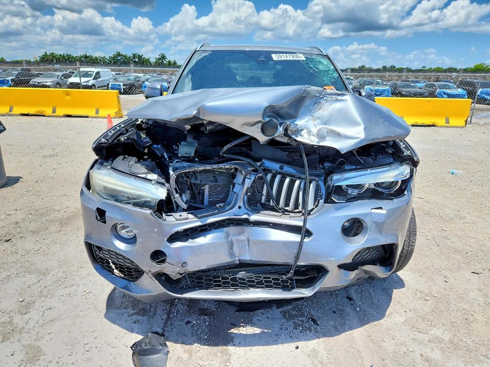 Photo 5 from auction – 2016 BMW X5 with VIN 5UXKR6C57G0J83477
