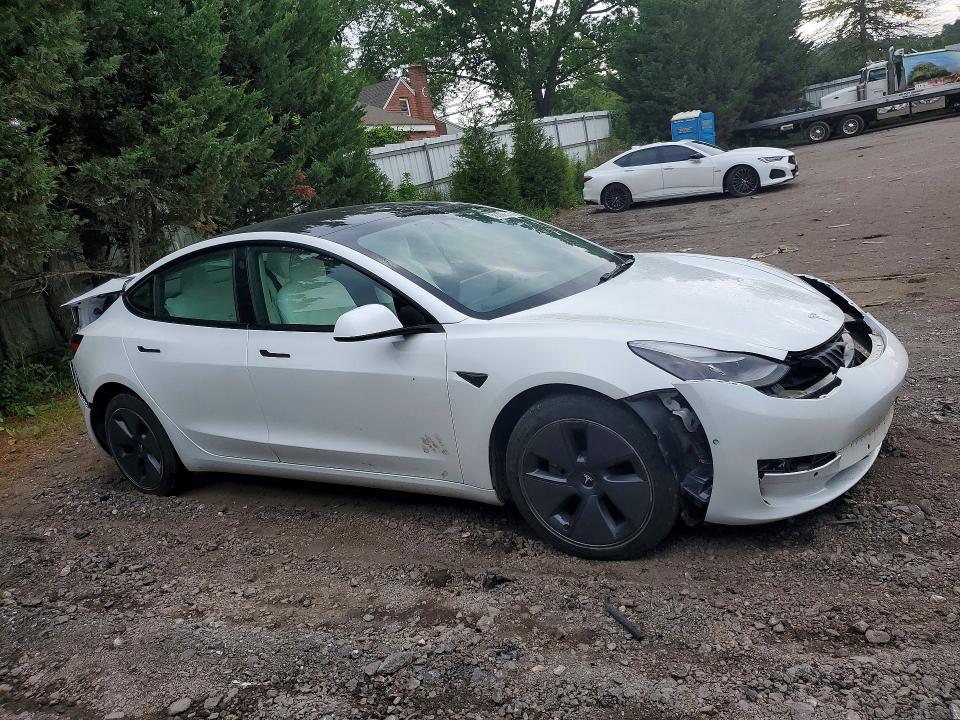 Photo 4 from auction – 2022 TESLA MODEL 3 with VIN 5YJ3E1EA5NF303404