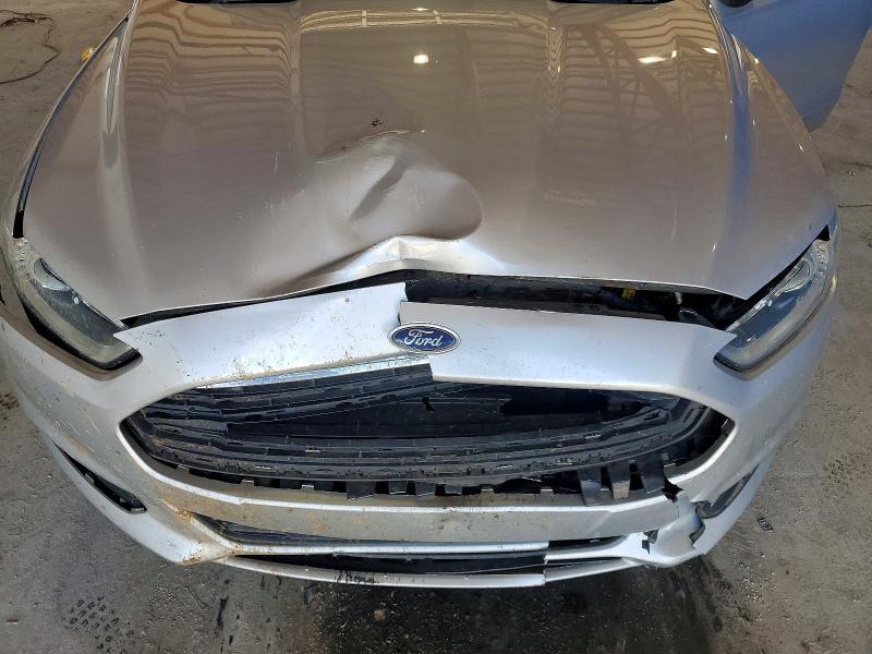 Photo 11 from auction – 2014 FORD FUSION with VIN 3FA6P0G77ER394764