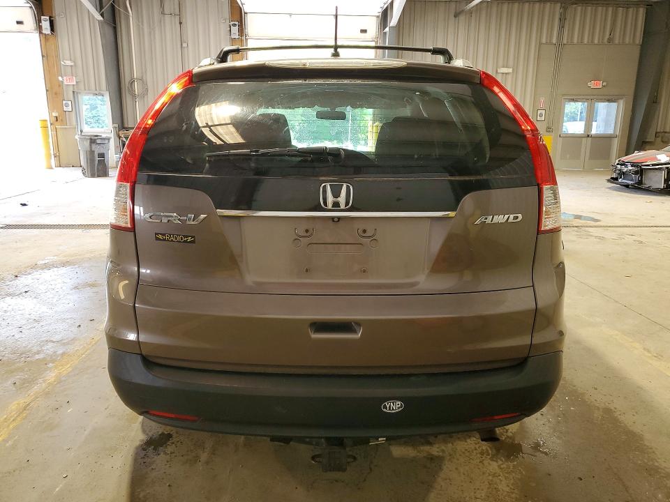 Photo 6 from auction – 2014 HONDA CR-V with VIN 2HKRM4H54EH700620