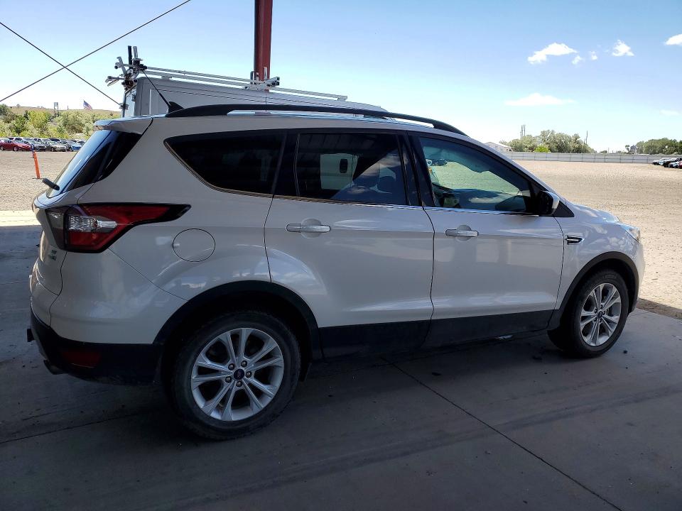 Photo 3 from auction – 2018 FORD ESCAPE with VIN 1FMCU9GD5JUC70488