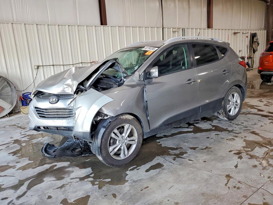 HYUNDAI TUCSON 2012 with VIN KM8JUCAC8CU394536 - Photo from auction