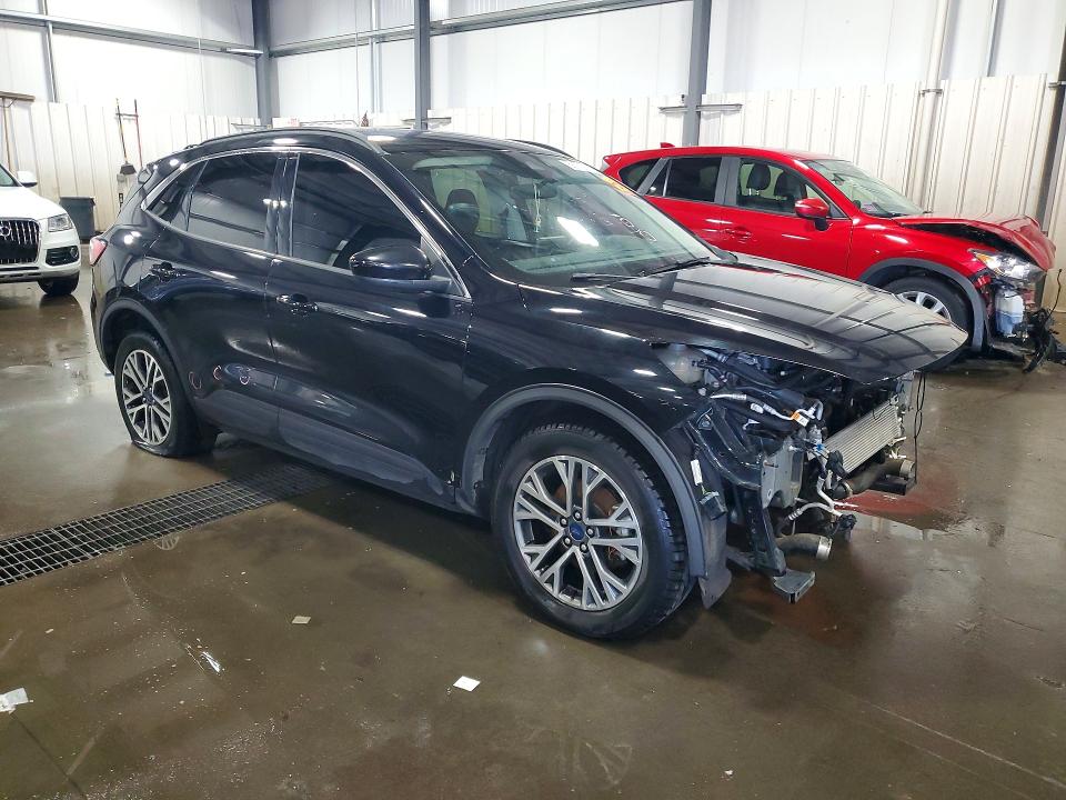 Photo 4 from auction – 2020 FORD ESCAPE with VIN 1FMCU9H68LUA81398