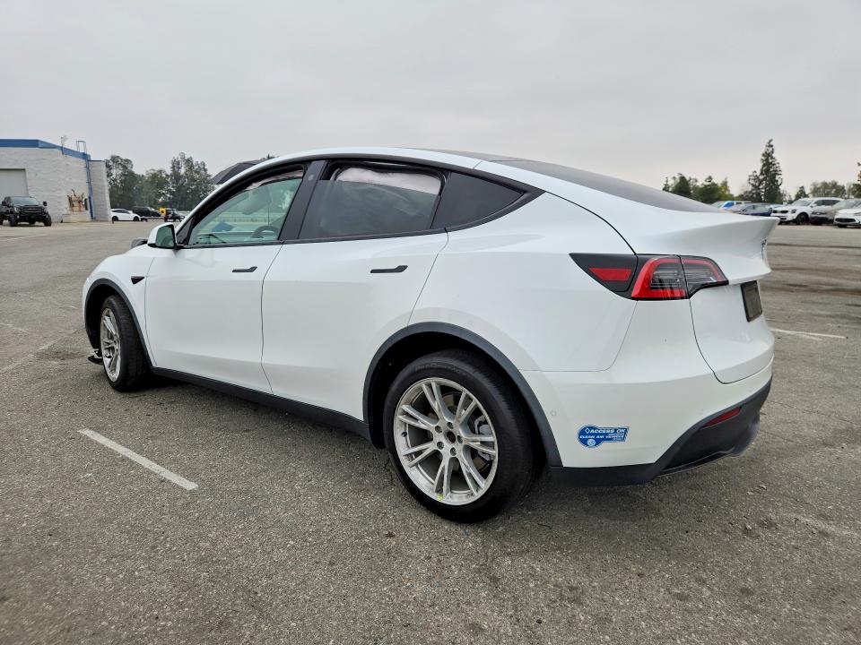 Photo 2 from auction – 2021 TESLA MODEL Y with VIN 5YJYGDEE5MF074645