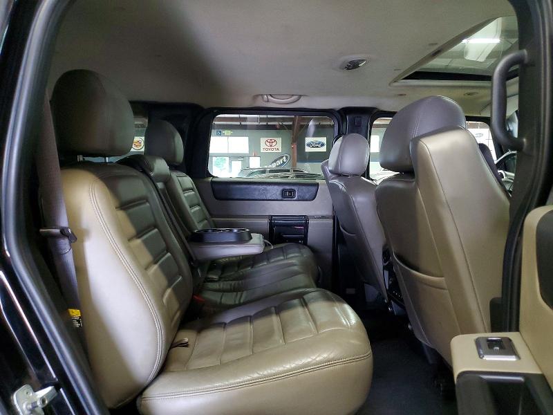 Photo 11 from auction – 2006 HUMMER H2 with VIN 5GRGN23U06H119962