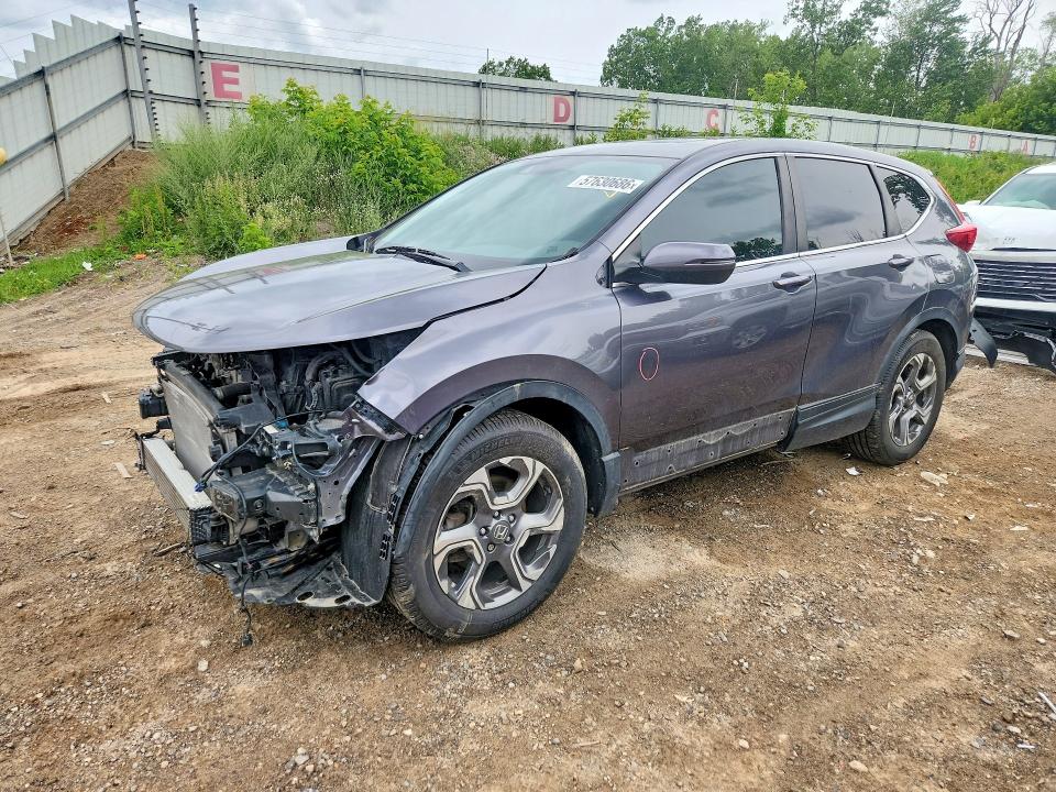 HONDA CR-V 2018 with VIN 5J6RW1H57JA011627 - Photo from auction