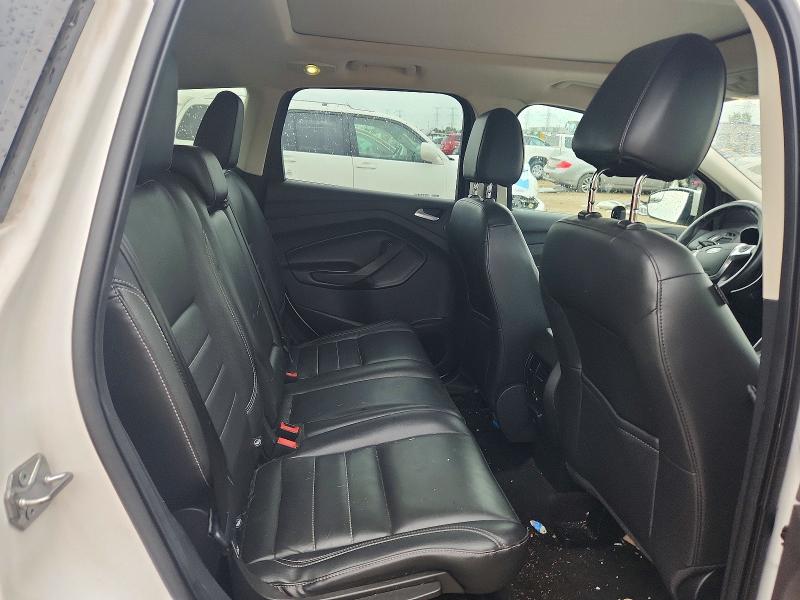 Photo 10 from auction – 2016 FORD ESCAPE with VIN 1FMCU0JX0GUB12454