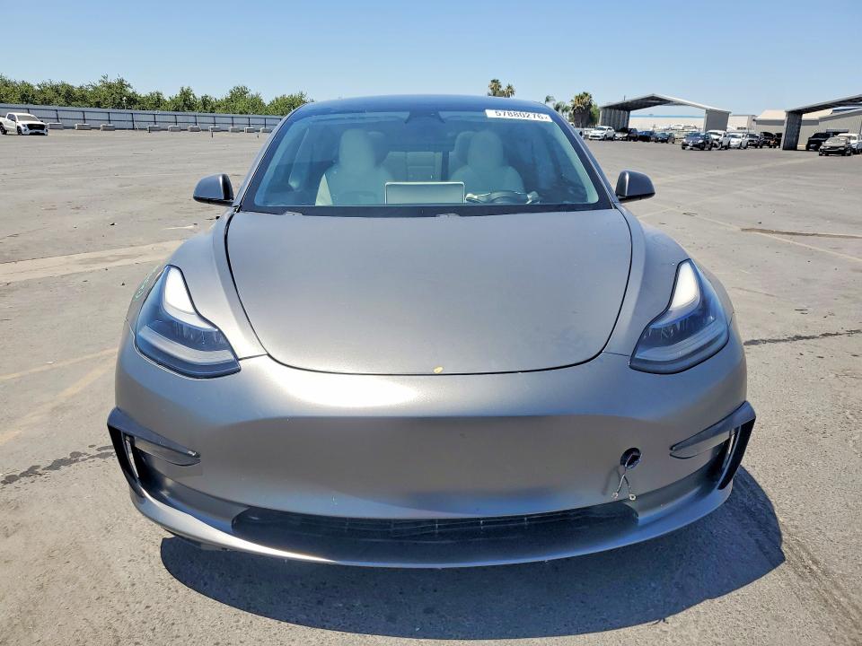 Photo 5 from auction – 2021 TESLA MODEL 3 with VIN 5YJ3E1EB1MF004113