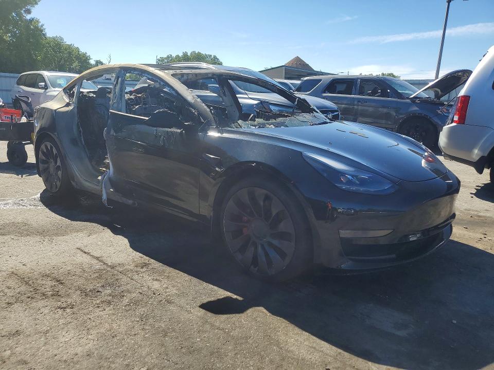 Photo 4 from auction – 2022 TESLA MODEL 3 with VIN 5YJ3E1EC9NF226862