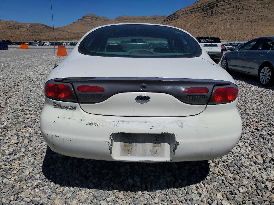Photo 6 from auction – 1999 FORD TAURUS with VIN 1FAFP53U1XA316258