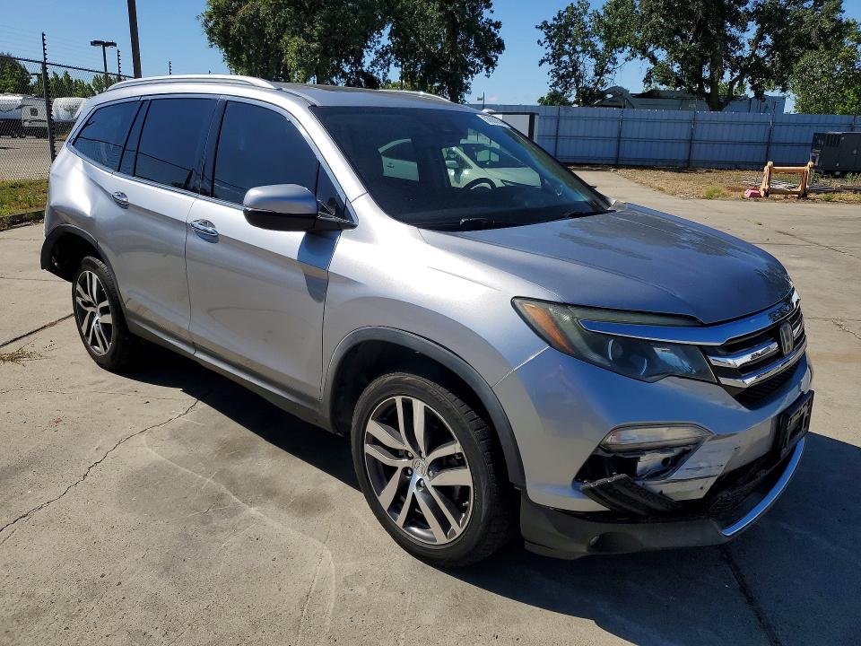 Photo 4 from auction – 2017 HONDA PILOT with VIN 5FNYF6H05HB002008