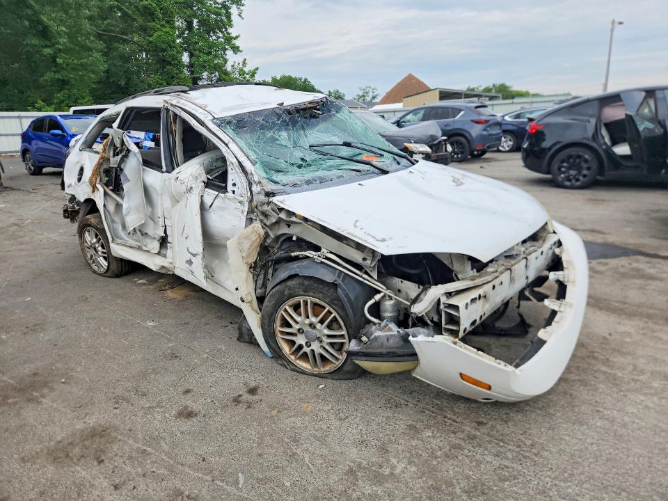 Photo 4 from auction – 2007 FORD FOCUS with VIN 1FAFP36N37W158713