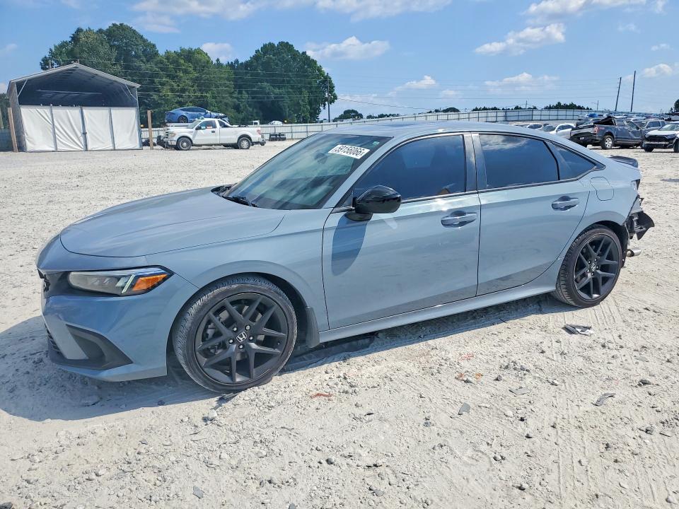 HONDA CIVIC 2023 with VIN 2HGFE1E56PH474211 - Photo from auction