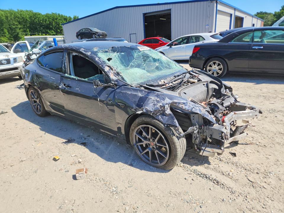 Photo 4 from auction – 2021 TESLA MODEL 3 with VIN 5YJ3E1EA0MF017541