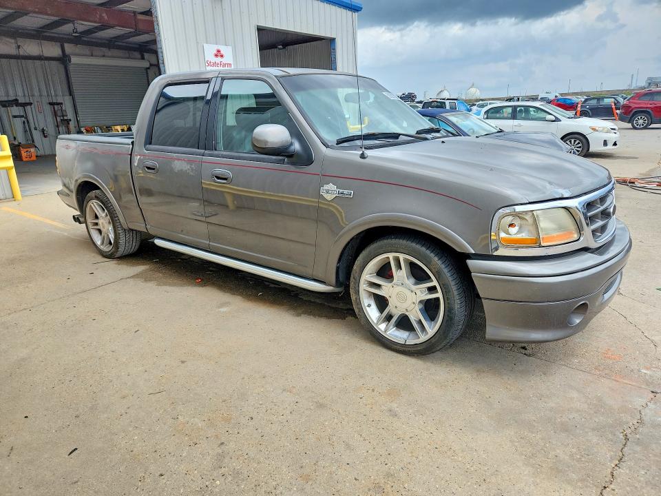Снимка 4 от търг – 2002 FORD F150 с VIN 1FTRW07372KD38962