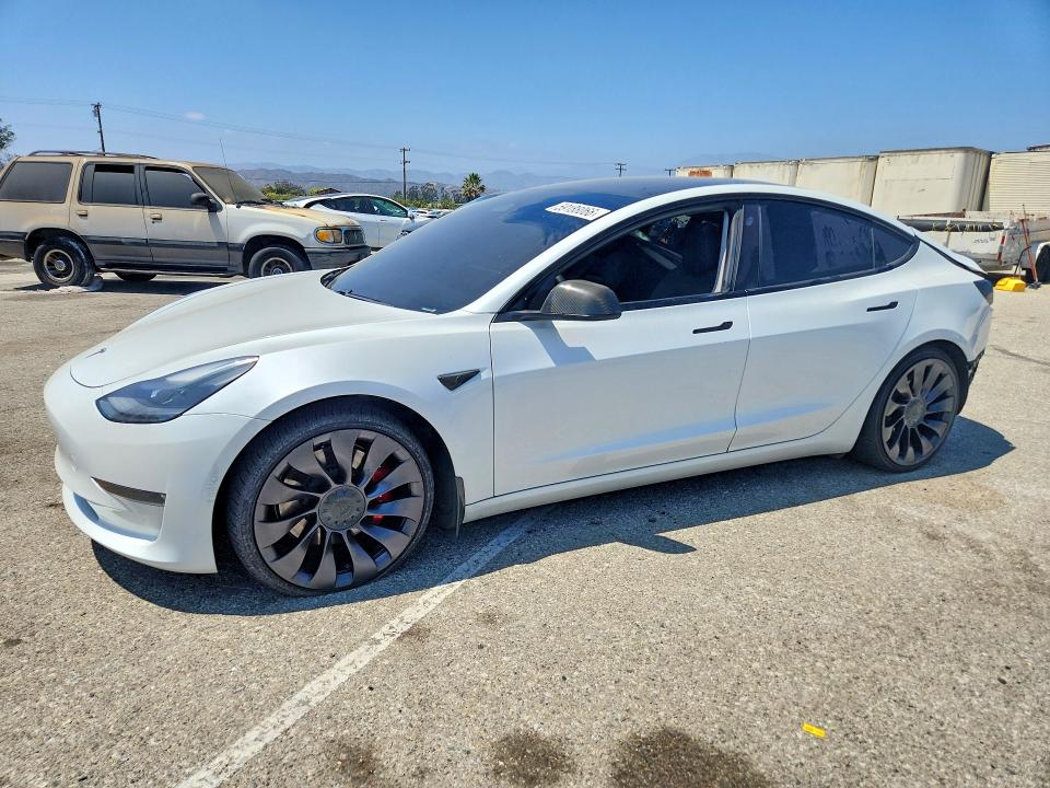 TESLA MODEL 3 2021 with VIN 5YJ3E1EC5MF064937 - Photo from auction