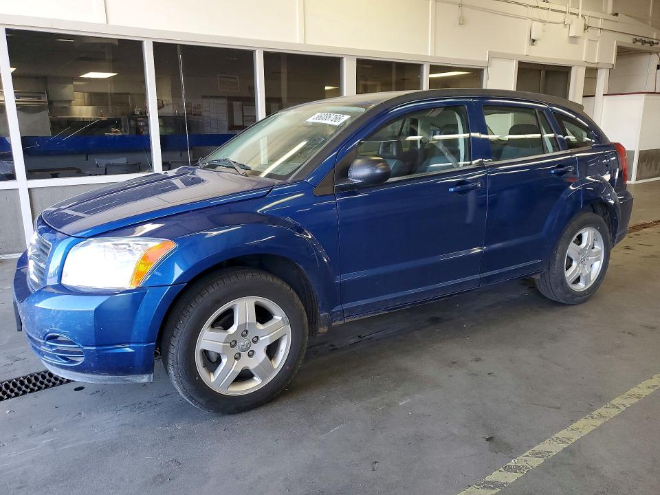 DODGE CALIBER 2009 with VIN 1B3HB48A09D144852 - Photo from auction