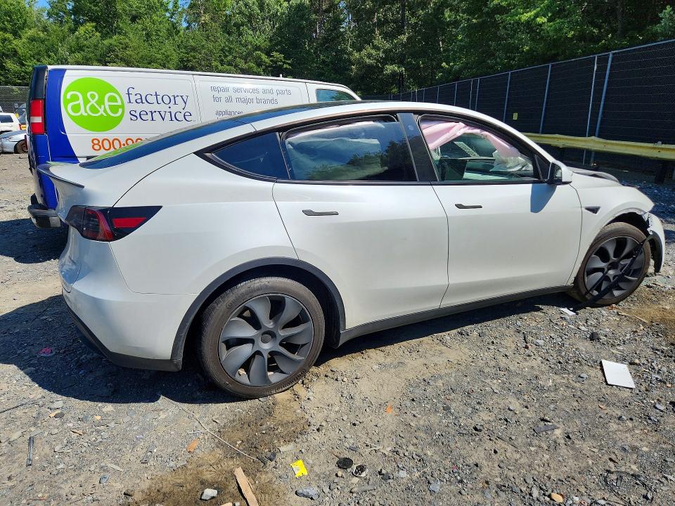 Photo 3 from auction – 2023 TESLA MODEL Y with VIN 7SAYGDEE6PF672573