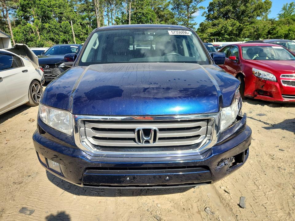 Photo 5 from auction – 2013 HONDA RIDGELINE with VIN 5FPYK1F50DB005042