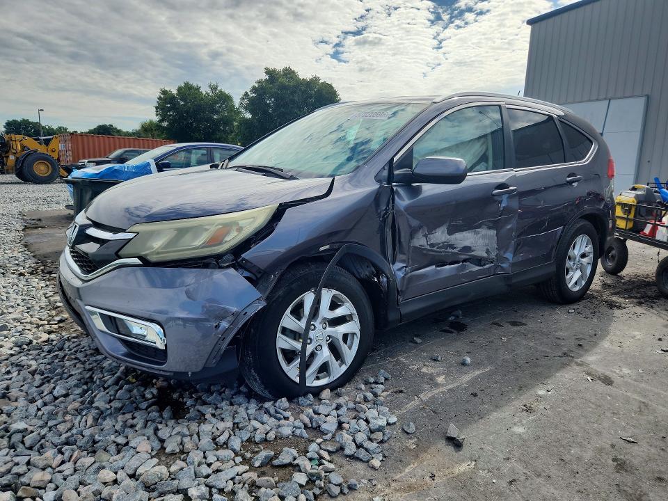 HONDA CR-V 2015 with VIN 2HKRM4H74FH707182 - Photo from auction