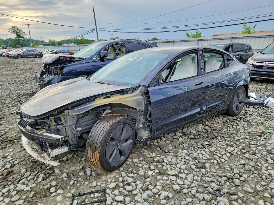 TESLA MODEL 3 2018 with VIN 5YJ3E1EB9JF056021 - Photo from auction