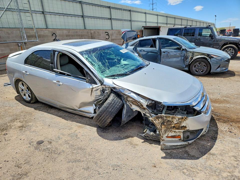 Photo 4 from auction – 2012 FORD FUSION with VIN 3FAHP0HA9CR258099