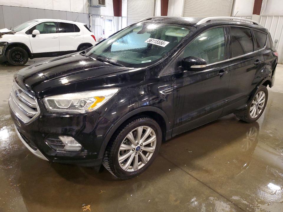 FORD ESCAPE 2017 with VIN 1FMCU9JD9HUE00131 - Photo from auction