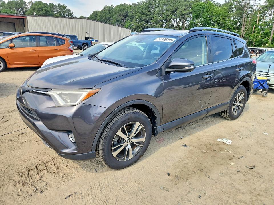 TOYOTA RAV4 2018 with VIN JTMRFREV6JJ717061 - Photo from auction