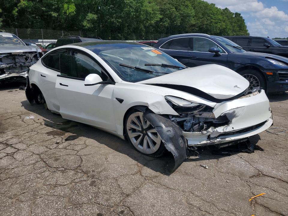 Photo 4 from auction – 2022 TESLA MODEL 3 with VIN 5YJ3E1EB0NF257313