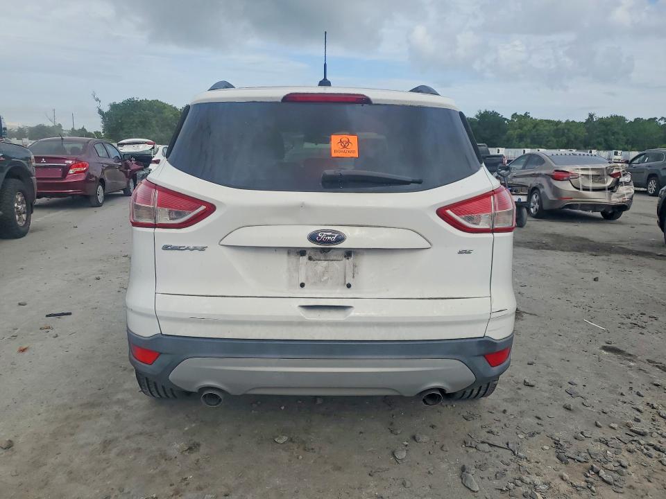 Photo 6 from auction – 2016 FORD ESCAPE with VIN 1FMCU0G71GUA59027