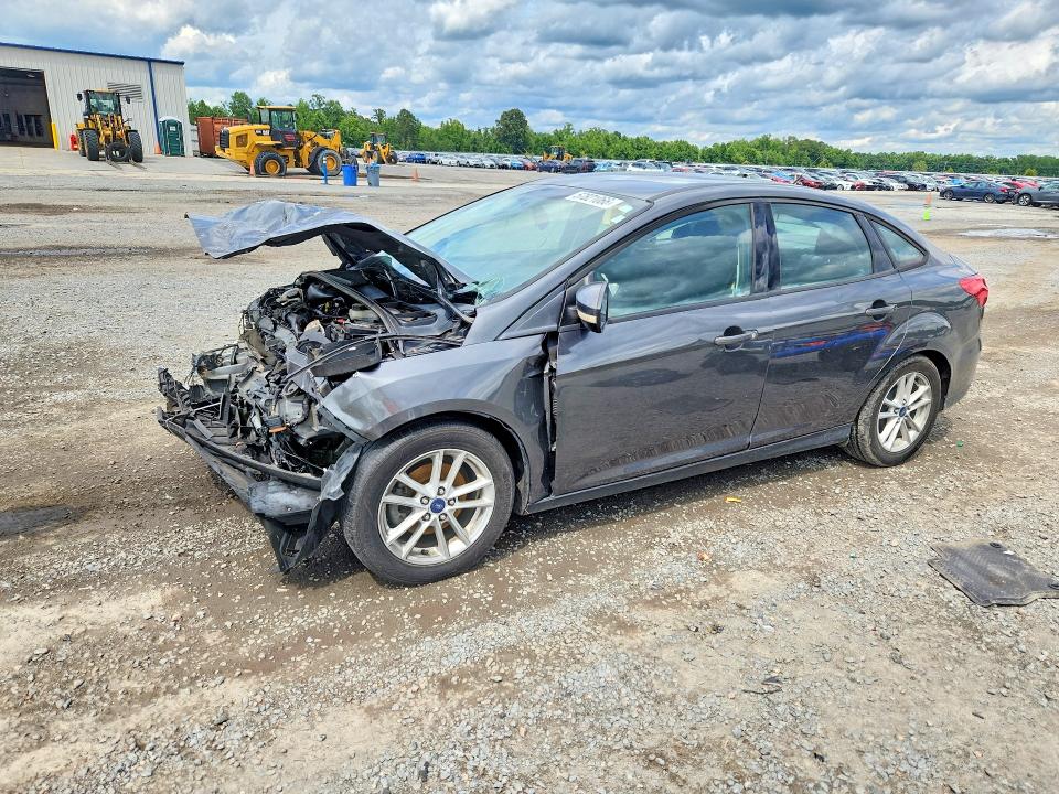 FORD FOCUS 2017 with VIN 1FADP3F29HL315497 - Photo from auction