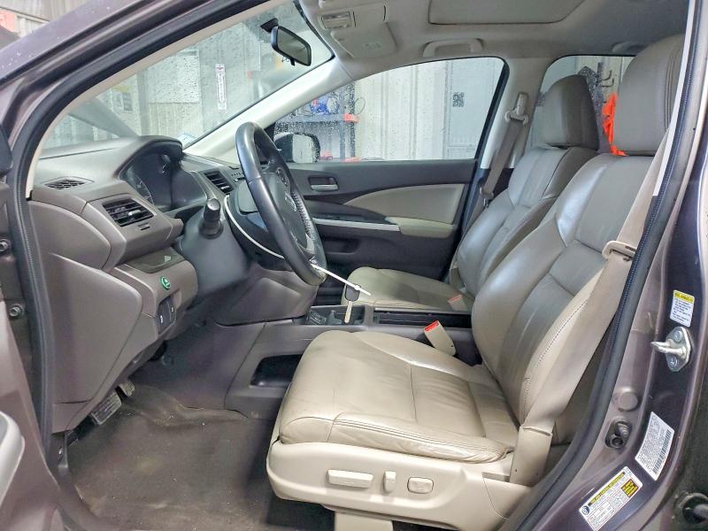 Photo 7 from auction – 2014 HONDA CR-V with VIN 2HKRM4H77EH665444