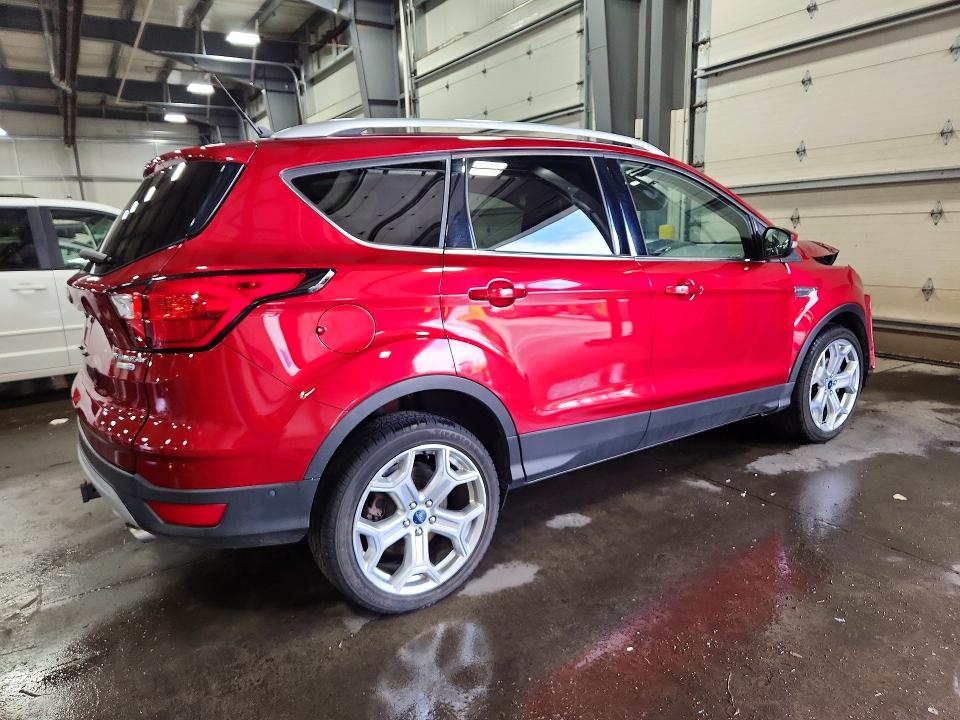 Photo 3 from auction – 2019 FORD ESCAPE with VIN 1FMCU9J90KUB61135