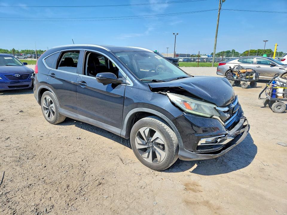 Photo 4 from auction – 2016 HONDA CR-V with VIN 5J6RM4H98GL106706
