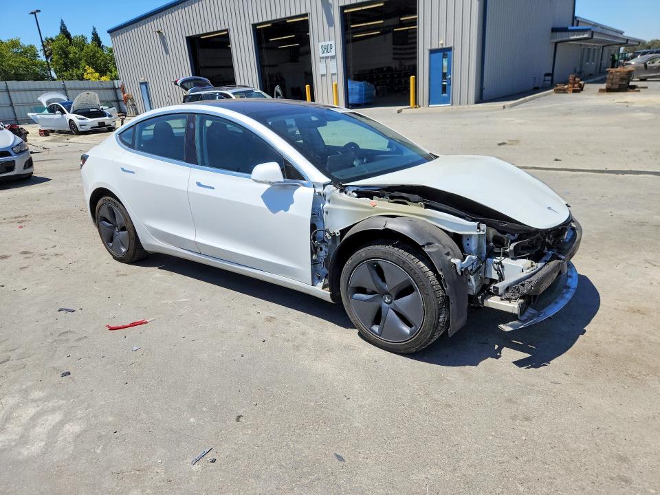 Photo 4 from auction – 2018 TESLA MODEL 3 with VIN 5YJ3E1EA0JF044573