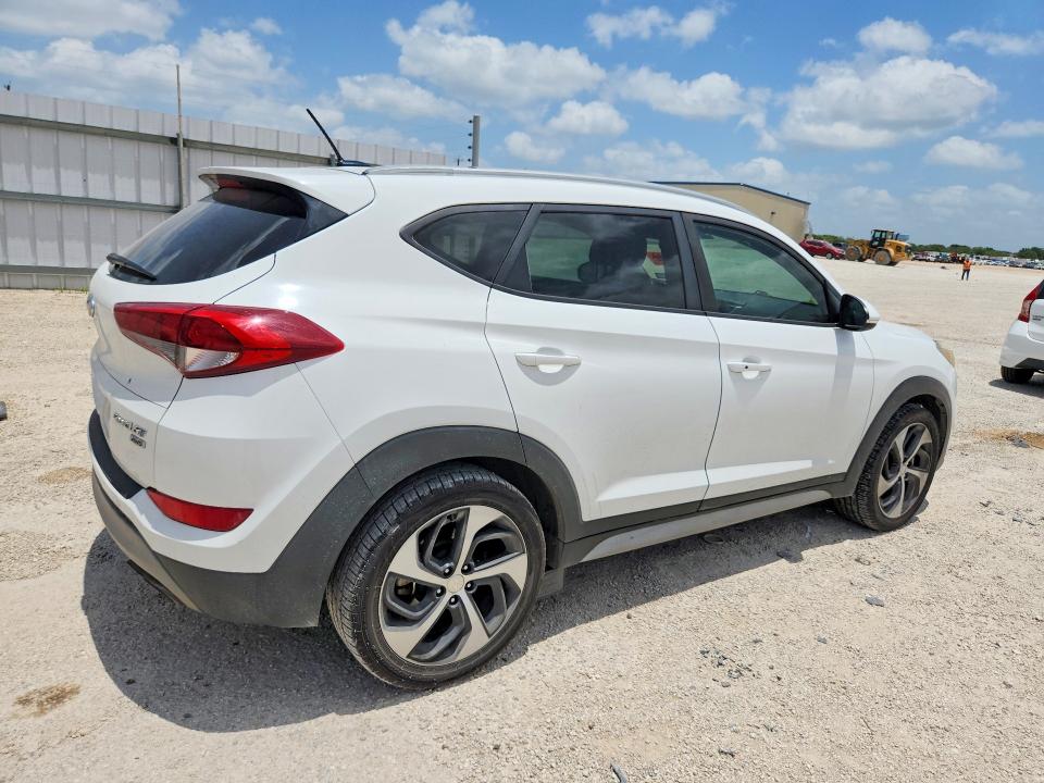 Photo 3 from auction – 2017 HYUNDAI TUCSON with VIN KM8J3CA29HU587022