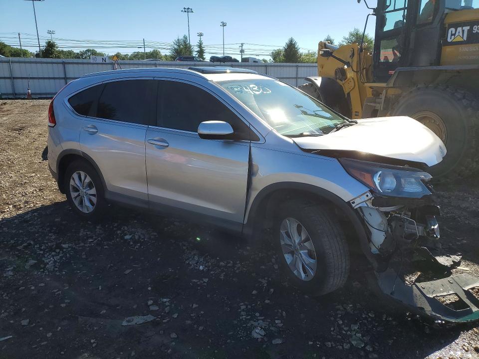 Photo 4 from auction – 2014 HONDA CR-V with VIN 2HKRM4H76EH623430