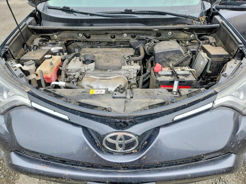 Photo 12 from auction – 2018 TOYOTA RAV4 with VIN JTMRFREV1JD226461