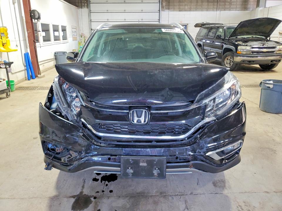 Photo 5 from auction – 2016 HONDA CR-V with VIN 5J6RM4H71GL116122