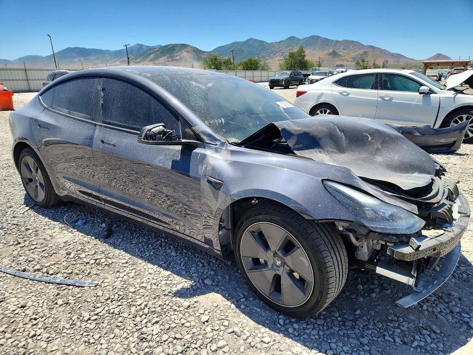 Photo 4 from auction – 2022 TESLA MODEL 3 with VIN 5YJ3E1EB4NF152208