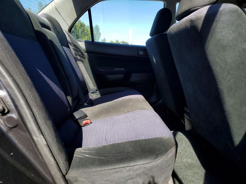Снимка 10 от търг – 2003 MITSUBISHI LANCER с VIN JA3AJ86EX3U010159