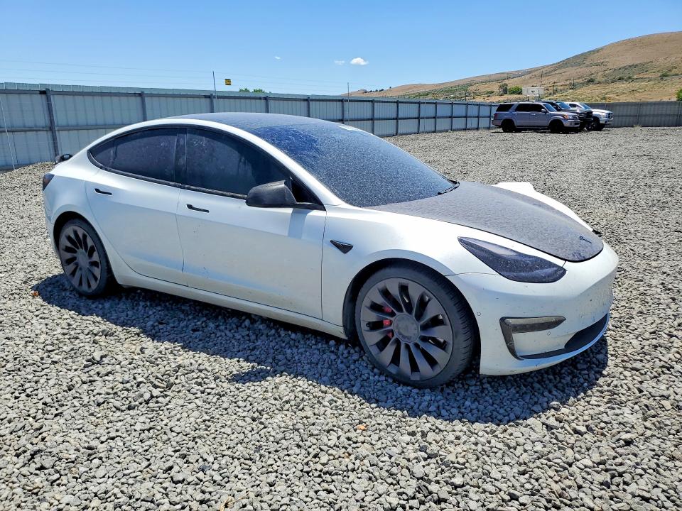 Снимка 4 от търг – 2021 TESLA MODEL 3 с VIN 5YJ3E1EC1MF070881