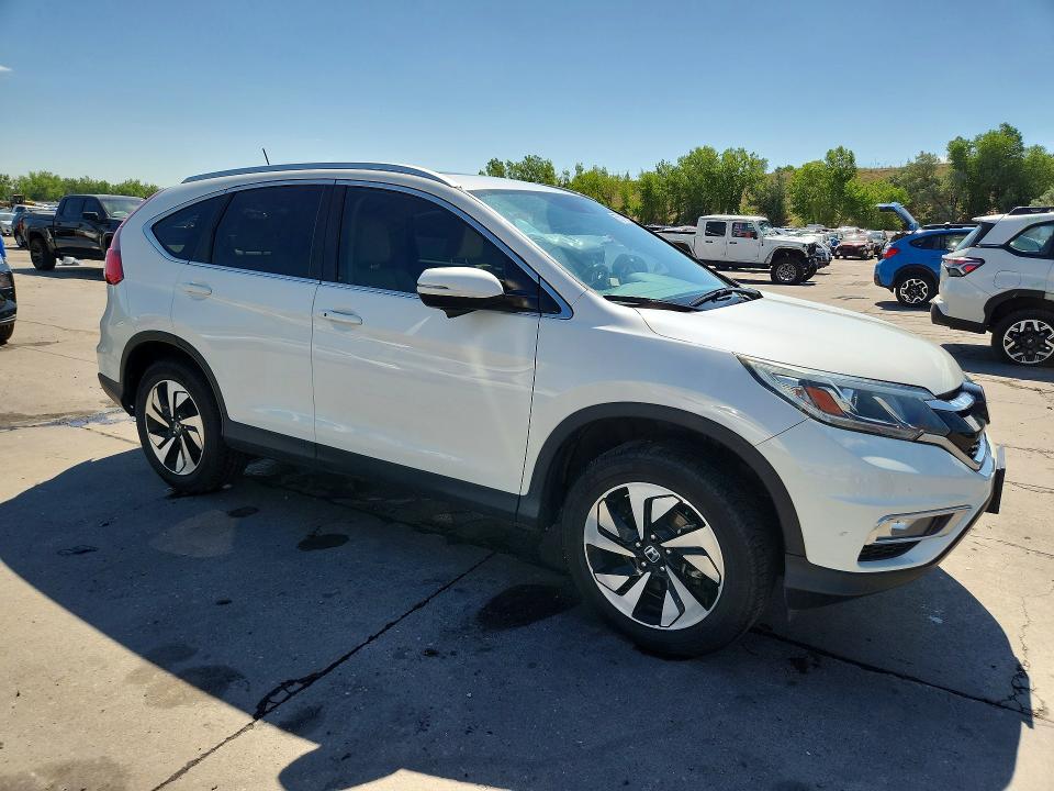 Photo 4 from auction – 2016 HONDA CR-V with VIN 5J6RM4H97GL012736