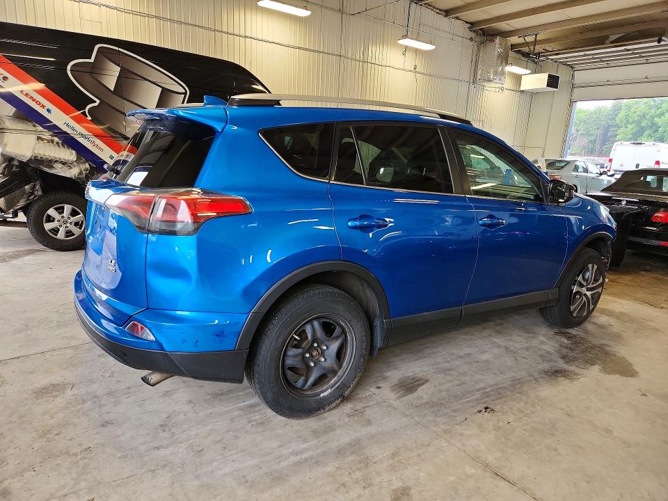 Photo 3 from auction – 2016 TOYOTA RAV4 with VIN 2T3BFREV5GW453911