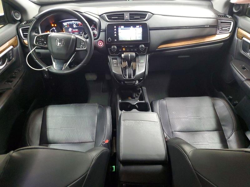 Photo 8 from auction – 2018 HONDA CR-V with VIN 7FARW1H84JE034133